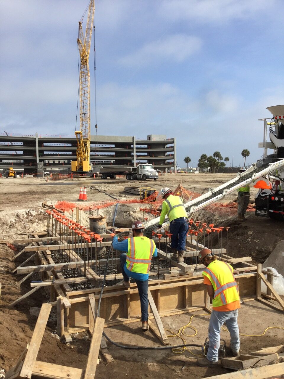 men working on concrete construction